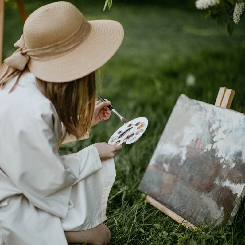Woman Painting Outdoors